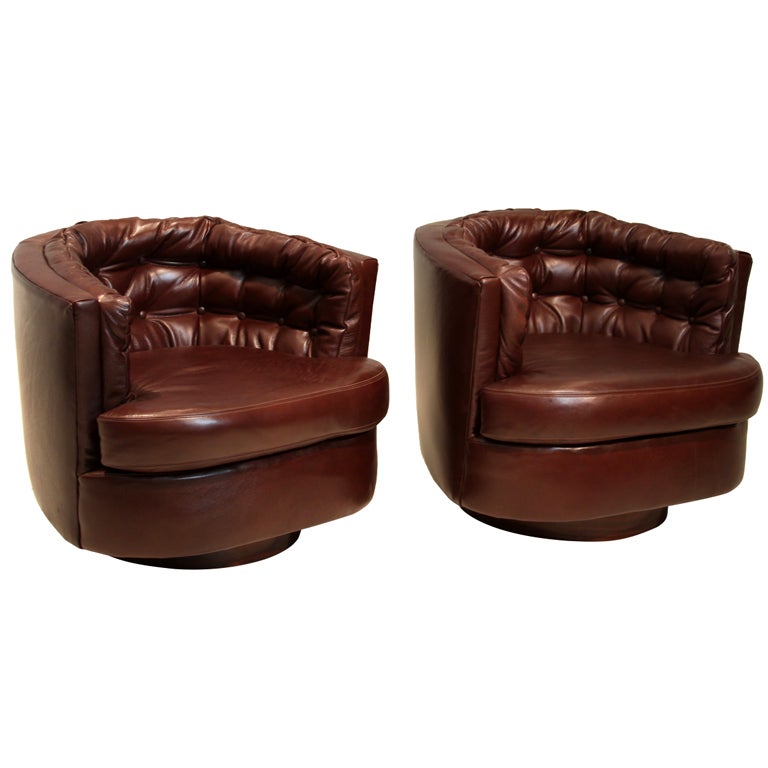 Pair Of Leather Tufted Barrel Swivel Chairs By Milo Baughman At