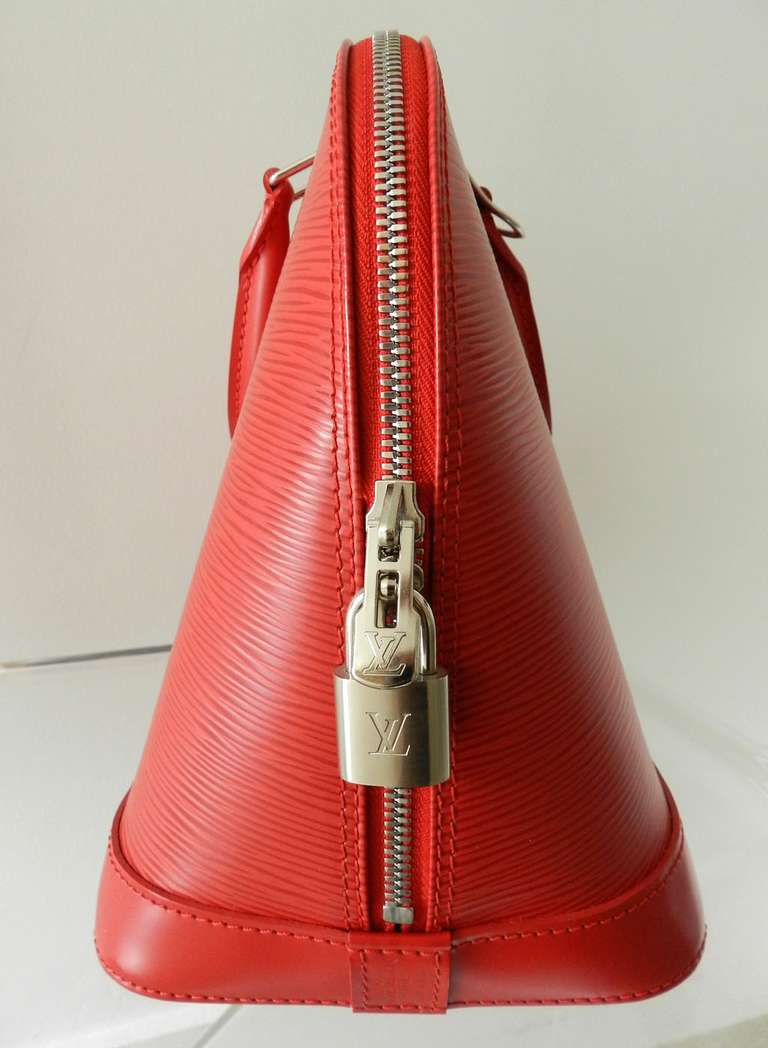 Louis Vuitton Red Epi Alma PM with Strap at 1stdibs