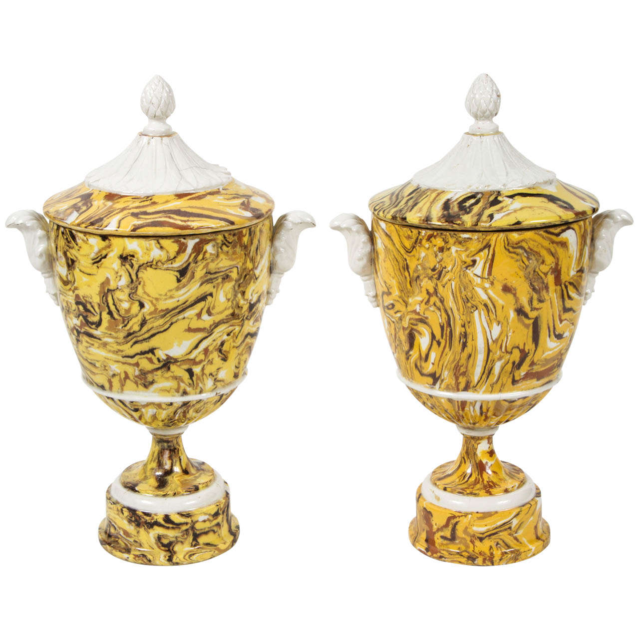 Pair of lidded Terre Melee urns, 19th century